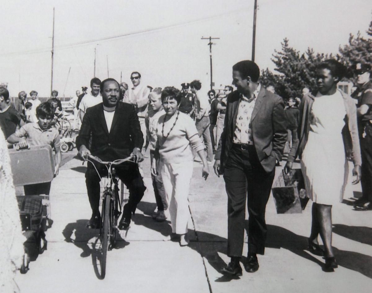 Dr. King riding a bike